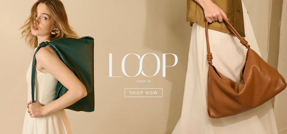 Modelo usando bolsa de couro feminina da marca Soleah
