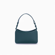 Flap Loop Soleah em couro verde: bolsa com aba frontal, formato compacto e alça longa para uso no ombro ou transversal; vista frontal, destacando a silhueta, o acabamento do couro e os principais elementos externos.