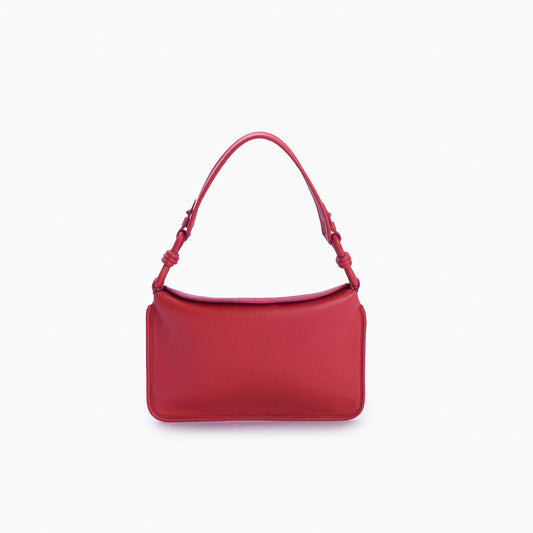 Flap Loop Soleah em couro vermelha: bolsa com aba frontal, formato compacto e alça longa para uso no ombro ou transversal; vista frontal, destacando a silhueta, o acabamento do couro e os principais elementos externos.