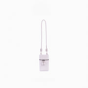Estojo Loop Soleah em couro off white: estojo compacto, com formato retangular e alça curta para transporte; vista frontal com a alça curta visível, destacando o formato compacto e o acabamento externo.